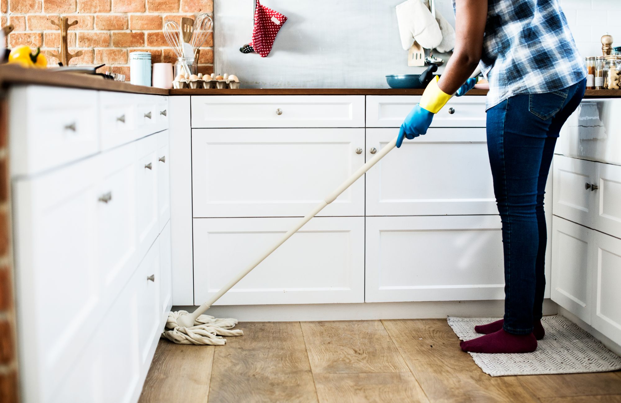 Black woman cleaning a house